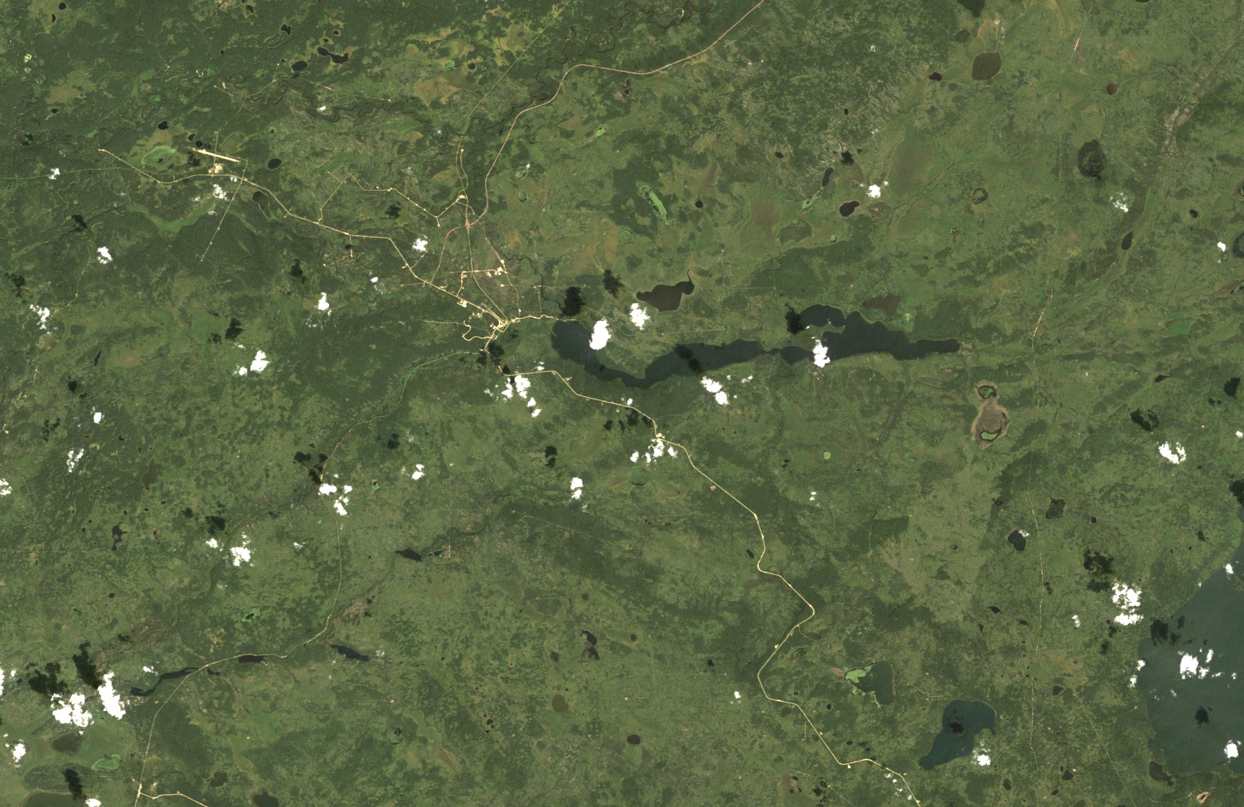 Satellite image of boreal forest around Christina Lake, Alberta, in 1984, with a few roads and faint cutlines